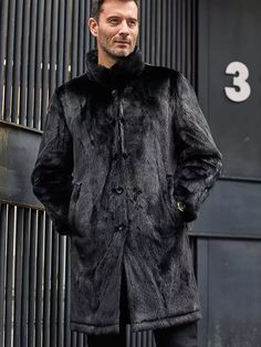 Men's Double Sided Long Fur Shearling Leather Coat In Black With this men's long fur shearling leather coat, you can up your winter look. This double-sided jacket is expanded in length and is made of genuine sheepskin leather with a semi-aniline finish and faux shearling lining. It delivers timeless warmth and sophistication in classic black and features a button fastening, a turn-down collar, and useful pockets. Outer Shell: Real Leather Leather Type: Sheepskin Leather Finish: Semi-aniline Inner Shell: Faux Shearling Feature: Double Sided Long Jacket With Black Fur Closure Style: Button Collar Style: Turn Down Inside Pockets: Two Outside Pockets: Two Side Pockets Color: Black Black Sheepskin Fur Coat With Faux Fur Lining, Luxury Black Long Fur Coat, Black Sheepskin Long Coat, Black Sheepskin Fur Coat For Winter, Black Sheepskin Fur Coat For Cold Weather, Black Long Winter Fur Coat, Black Long Faux Fur Coat, Luxury Black Fur Coat For Cold Weather, Leather Shorts Women