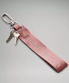 Never Lost Keychain | Unisex Bags,Purses,Wallets | lululemon Lulu Lemon Keychains, Pink Keychain With Key Leash, Trendy Travel Keychains With Key Clip, Logo Charm Bag For Everyday Use, Rectangular Key Leash Bag Charm For Everyday, Trendy Bag Charm Keychain For Everyday Use, Trendy Bag Charm With Key Clip For Everyday Use, Pink Keychain With Key Clip For Everyday Use, Never Lost Keychain