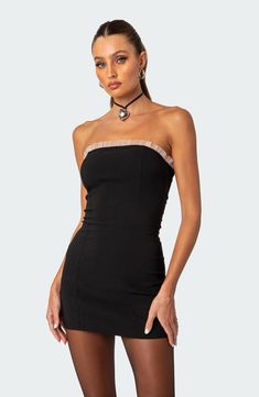 A subtle sheer ruffle trims the top of this figure-hugging minidress made with stretch. Hidden back-zip closure Strapless 95% polyester, 5% spandex Machine wash, dry flat Imported