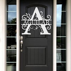 a black door with the letter a on it