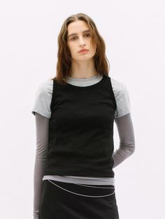 This is a feminine and modern top by WEARIS that is made out of high quality and sturdy material. With distinctive mood of the design and comfortable wear, you can style it for your comfortable daily outfit.- Tight fit layered t-shirt- Soft touch and high air permeability- Modern and minimal mood Versatile Crew Neck Tank Top, Versatile Everyday Crew Neck Tank Top, Fitted Muscle Tee For Spring, Fitted Muscle Tee For Everyday Spring Wear, Versatile Fitted T-shirt, Black T-shirt For Layering In Spring, Black T-shirt For Spring Layering, Basic Stretch T-shirt For Layering, Trendy Fitted Tank Top For Layering