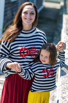 Celebrate Maine, the sea, and discovery with this fun lobster sweater! Featuring classic nautical stripes and a bright red Maine lobster, this cozy alpaca sweater is perfect for cold winter nights and beyond. Whether you're sailing the open waters, relaxing by the fire, or shredding the local slopes, this nautical sweater is ready for any adventure. Mex and Match with your mini me with our Kids' Striped Lobster Alpaca Sweater Did we mention these cozy "alpacryclic" sweaters are unisex and make t Lobster Sweater, Paper Star Lanterns, Lobster Design, Nautical Sweater, Star Lanterns, Maine Lobster, Sand Sea, Nautical Stripes, Acrylic Sweater