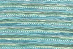 a blue and green striped knitted blanket