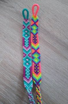 two colorful bracelets on a wooden table