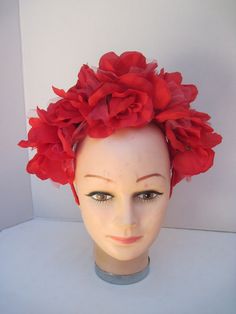 * A versatile headpiece this vibrant red rose fascinator can be worn all year round from now to Halloween to Christmas to Valentine's Day and any events in between! * The roses are nestled together to form the traditional halo affect and the pieces is well balanced, secure and comfortable to wear. * It has been designed on an acrylic headband covered in grosgrain ribbon. * Great for a Bridesmaid's headpiece, this can be made in any color desired. Wear it for Halloween, Ladies Luncheon, Benefit D Red Summer Fascinator With Handmade Flowers, Summer Red Fascinator With Handmade Flowers, Red Handmade Flowers Fascinator For Summer, Red Flower Hair Accessories For Party, Red Flower Headband With Handmade Flowers, Red Flower Fascinator For Party, Adjustable Red Fascinator With Handmade Flowers, Red Headpieces With Handmade Flowers, Adjustable, Red Handmade Flower Hair Accessories For Party