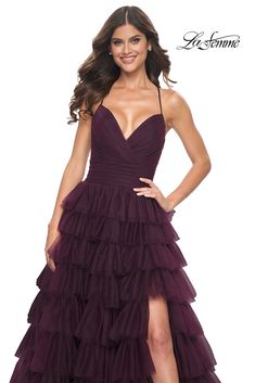 La Femme 32086 Ruffle tiered a-line ball gown with a unique ruched bodice and lace up back. Back zipper closure. Ruched Bodice Dress With Ruffled Straps For Prom, Dresses With Ruched Bodice And Ruffled Straps For Prom, Gala Dresses With Ruched Bodice And Ruffled Straps, Prom Dress With Ruched Bodice And Ruffled Straps, Tiered Ruffle Evening Dress For Wedding, Tiered Ruffle Wedding Evening Dress, Formal Tiered Dress With Fitted Bodice, Fitted Bodice Ball Gown With Ruffles For Debutante Ball, Ruffled Ball Gown With Fitted Bodice For Debutante Ball