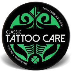 a black and green tin with the words classic tattoo care on it