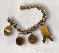 "GORGEOUS VINTAGE 14K YELLOW GOLD HEAVY CHARM BRACELET WITH VINTAGE CHARMS! 7 1/2\" 14K GOLD 11mm Width Bracelet! 4 CHARMS INCLUDING: Round Merry Xmas (Engraved on back: Love Lee 1962) measures 1\" round. Boy Face Silouette (Engraved on back: Wayne Lee 12-31-62) measures 3/4\" round. Horseshoe w/diamond Carry me for Goodluck (Engraved on back: 12/25/63) measures 3/4\" round. KEY LIKE ? CHARM (Engraved M.S.F. BERLIN and LR) measures 1 1/2\" x 3/4\" Fully hallmarked/tested acid/spectrometer SOLID Vintage Brass Gold Bracelet Gift, Vintage Brass Bracelet For Gift, Antique Yellow Gold Bracelets With Vintage Charm, Vintage Gold Bracelet With Charms, Vintage Yellow Gold Charm Bracelet Gift, Vintage Brass Gold Bracelet For Gift, Vintage Gold Bracelets With Charms, Gold Vintage Bracelets With Charms, Antique Gold Bracelets With Vintage Charm