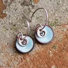 Sweet Heart Charm Earrings, Light Blue Topaz Enamel Discs, Sterling Silver, Handstamped Jewelry, Gift for Girl, Birthstone Colors, Dangle by BloomingEnamels on Etsy https://www.etsy.com/listing/479795974/sweet-heart-charm-earrings-light-blue Blue Stamped Jewelry For Gifts, Blue Stamped Jewelry For Gift, Torch Enameling, Handstamped Jewelry, Chunky Silver Necklace, Topaz Birthstone, Birthstone Colors, Fine Silver Jewelry, Heart Frame