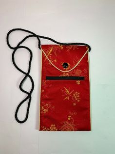 Vintage Chinese Red Satin Phone Case Mimi Handbag Shoulder Cross Body Zip Pocket. Condition is Pre-owned. Shipped with USPS Priority Mail.This little  red satin bag could also be used as a phone case. It will hold iPhone XR and 11.There is a small zippered pocket for credit cards or cash..The cord strap can be worn as a shoulder or cross body style. It measures 9 in high and 5 in wide. The strap is 38 in long. Red Handheld Portable Shoulder Bag, Red Portable Handheld Shoulder Bag, Red Rectangular Evening Bag For Mobile Phones, Red Rectangular Phone Bag For Everyday Use, Red Portable Crossbody Phone Bag, Red Crossbody Phone Bag, Red Mobile Phone Travel Pouch, Red Rectangular Portable Phone Bag, Red Phone Bag With Removable Pouch