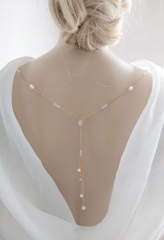 This is an original design by © Isabella Bridal. DETAILS - Freshwater pearl  -Cubic Zirconia teardrop  - Drop length: 6.5 inches. -Primary color: Silver, Rose Gold -The back necklace has a clasp(lobster claw) on each end to attach to the back of a dress. Note: You must attach loops to the dress in order to clip back jewelry. Feel free to contact me with any questions! Custom orders are welcome. All orders will ship within 48 hours, except for weekends ALL ORDERS ARE SHIPPED VIA USPS FIRST CLASS WITH TRACKING. Handmade in the USA. This item is Made-to-Order and therefore is a final sale. Necklace Wedding Dress, Wedding Dress Back, Wedding Dress Backs, Bridal Details, Jewelry Rose Gold, Back Necklace, Y Necklace, Back Drop, Dress Back