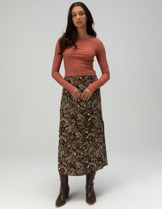 O'neill Sunni Rosa Midi Skirt. Allover Print. Leg Slits At Each Side. Discrete Side Zipper Closure. Approx. Length: 35.5''. 100% Viscose. Machine Wash. Imported. Model Is Wearing A Size Small. Model Measurements:height: 5'8" Bust: 32"waist: 24"hips: 35" Long Fall Skirt, Skirt Casual, Pencil Skirts, Black Midi Skirt, Fall Skirts, Women Skirts Midi, Model Measurements, Side Zipper, Pencil Skirt