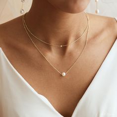 S H O W ∙ Y O U R ∙ S T Y L E 😍UNIQUE ♥ Handmade natural pearl design in 14K Gold plated, Beautiful necklace for her, Wear it either for everyday use or for special occasions. 🎁PERFECT GIFT ♥ Make your friends or family happy with this exclusive gift. 🙌MINIMALIST DESIGN ♥ Wear this jewelry with joy and show your style with the wonderful designs. 😊SATISFACTION GUARANTEE ♥ Your satisfaction is always our priority. Please feel free to contact us if you have any questions or requests regarding y Delicate Double Strand White Jewelry, White Delicate Double Strand Jewelry, Delicate White Double Strand Jewelry, Gold Pearl Birthstone Jewelry, Anniversary Pearl White Double Strand Necklace, White Double Strand Clavicle Chain Jewelry, Double Strand Pearl Chain Jewelry For Anniversary, Pearl White Clavicle Chain Necklace For Anniversary, Double Strand Pearl Drop Jewelry For Wedding