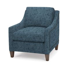 the arm chair is upholstered with wood legs and blue fabric, it has a wooden