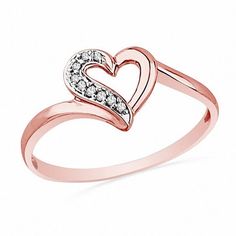 Treat her to a look with a little shimmer and a lot of love. Beautifully crafted in precious 10K rose gold, this simple band is topped with a diamond-accented open heart. Destined to delight, this charming ring is finished with a bright polish. Heart Rings Engagement, Heart Ring Design, Heart Rings, Gold Heart Ring, Black Gold Jewelry, Flower Engagement Ring, Gold Rings Fashion, Peoples Jewellers, Engagement Ring White Gold