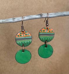 Handmade earrings using copper pennies, hand fired enamel, with hand painted design and resin to seal. Copper Pennies, Hand Made Jewelry, Paint Designs, Clay Jewelry, Handmade Earrings, Wire Jewelry, Penny, Jewelry Earrings Dangle, Etsy Earrings