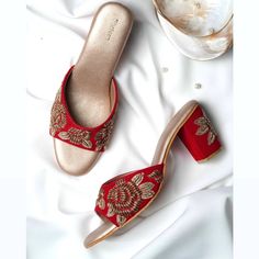 Color : Red Heel size : 2.75 inches Material : Suede A perfect match for your big day Indian style! These heels have been handcrafted by our artisans whose generations have been contributing in keeping the Indian tradition of Embroidery art alive. These heels have been handmade using organic and animal cruelty free materials . The sole made of memory foam cushion to provide utmost comfort. Any color or design customisation is welcomed. Just drop us an email at shrivasbyarchitaseo@gmail.com or wh Indian Bridal Footwear, Bridal Heels Indian, Bridal Footwear Indian, Indian Heels, Red Bridal Shoes, Bridal Footwear, Heels Block, Red Suede Heels, Zardozi Embroidery