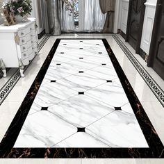 a white and black marble floor in a bathroom