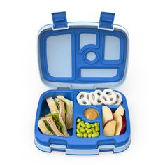 a blue lunch box filled with food on top of a white table next to an apple