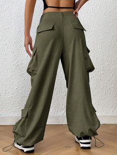 Whether you're trekking in the wilderness or just roaming through your neighborhood, you'll love the style and sheer convenience of these Trendy Solid Flap Side Pocket Cargo Pants! They feature a drawstring waist and pockets galore, with a polyester fabric that's perfect for any casual occasion. Time to turn up your fashion-savvy, adventurer. Specifications: Type: Cargo Pants Closure Type: Drawstring Waist Details: Drawstring, Pocket Waist Line: Natural Length: Long Fit Type: Regular Fit Fabric: Trendy Denim, Casual Denim, Drawstring Waist, Cargo Pants, Polyester Fabric, Pants