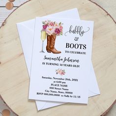 two wedding cards with boots and flowers on them