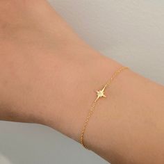 ✨ 925 Sterling Silver North Star Bracelet - 14K Gold Celestial, Minimalist Gold North Star, Dainty Starburst Bracelet ✨ Embrace the timeless allure of celestial beauty with our 925 Sterling Silver North Star Bracelet, featuring a delicate starburst charm in 14K gold. This minimalist piece exudes elegance and sophistication, making it a stunning addition to any jewelry collection. 🌟 Key Features: 🌟 Material: Crafted from high-quality 925 sterling silver and adorned with a celestial starburst ch Gold Star Jewelry, Celestial Bracelet, Starburst Bracelet, Dainty Gold Bracelet, Gold Starburst, Pretty Jewelry Necklaces, Bracelet Dainty, Girly Accessories, Crystal Beads Bracelet