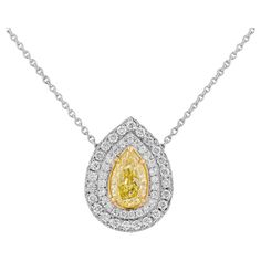 A timeless classic ! Beautiful Fancy Yellow Pear Shape Diamond Pendant with 2 rows of white diamond halo around to highlight the beauty of the stone, totaling 0.5ct of full brilliant cut round diamonds mounted in Platinum950 & 18K Yellow Gold Center stone: 0.71ct Natural Fancy Yellow Even VS1 Pear Shape; GIA#1216831101 Measurements Chain: 16 inches Pendant size: 11.6x16mm Height: 6mm Weight: 6.6gr Retail value: 16,000$ Comes with box, original GIA certificate, appraisal available upon request Pear Shaped Pendant, Gia Certificate, Jewellery Sketches, Pear Shaped Diamond, Diamond Halo, Pear Shape, Halo Diamond, Diamond Pendant, White Diamond