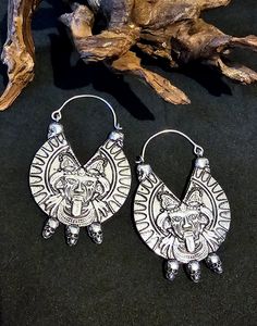 This listing is for 1 pair of solid brass heavy mahakala hoop ear weights/ earring. please check the weight before purchase if you will wesr these as regular earrings.  Dimensions  Length: 68mm Width:43 mm Weights: 24 grams each  Gauge : 1 mm SHIPPING BY INTERNATIONAL AIRMAIL - DOES NOT PROVIDE TRACKING  I ship orders in the order they are received and according to requests (processing time may vary depending on work volume)  shipping times (times vary)  Usually 2-3 working days for UK destinati Traditional Festival Plug Earrings Nickel Free, Bronze Dangle Earrings For Festivals, Traditional Metal Earrings For Rituals, Oxidized Finish Earrings For Rituals And Festivals, Traditional Metal Hoop Earrings (pierced), Traditional Metal Hoop Earrings For Festivals, Traditional Festival Plug Earrings With Ear Wire, Small Hoop Metal Earrings For Festivals, Traditional Silver Plug Earrings For Festival