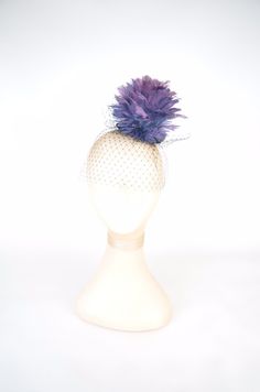 Feathered Flower Fascinator Hat Statement Headpiece A statement cocktail hat, that will certainly make everyone look twice! Purple ombre feathered flower in a deep purple lace base complemented by black veil cascading over the face. The base is 9.5cm diameter and the piece is approximately 10.5cm high.  Secures to the head with an elastic. You are buying the piece you see in the photos. I have tried my utmost to show the colours accurately, however dependent on your monitor settings the colours Whimsical Adjustable Costume Hats And Headpieces For Party, Adjustable Mini Hat For Kentucky Derby Party, Summer Party Mini Tulle Hats, Summer Party Mini Hats Made Of Tulle, Adjustable Headpiece For Party And Carnival, Adjustable Mini Hats For Royal Ascot Party, Feathered Fascinator For Royal Ascot Party, Royal Ascot Party Fascinator With Feathers, Adjustable Headpiece For Carnival Party