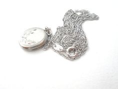 Vintage Jewelry - This is a sterling silver 18" link chain with a small oval locket pendant. The pendant is .75" (includes jump ring) by almost .5" wide, weighs 3 grams, and is hallmarked Sterling, signed WEB. Sterling Silver Locket Necklace With Oval Link, Classic Silver Locket Necklace With Oval Link, Classic Silver Oval Link Locket Necklace, Sterling Silver Oval Link Locket Necklace, Silver Sterling Silver Locket Necklace With Oval Link, Nickel-free Silver Oval Locket Necklace, Silver Oval Locket Necklace Nickel-free, Silver Oval Locket Necklace Nickel Free, Oval Sterling Silver Locket Necklace