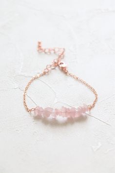 Rose quartz bracelet in rose gold plated. Gemstone size: about 15mm Metal component: 18k gold plated with brass base Bracelet length: 6 inches with 2 inches extender The price is for one bracelet. ﹎﹎﹎﹎﹎﹎﹎﹎﹎﹎﹎﹎﹎﹎﹎﹎﹎﹎﹎﹎﹎﹎ Please kindly understand that every crystal is natural and they are not perfect, but they are both gorgeous. I will send the crystal to you randomly. It may not exactly the same with the one in pictures but they are comparable in size, color and quality. If you have any request, Dainty Rose Quartz Jewelry In Rose Gold, Elegant Rose Gold Beaded Bracelets With Rose Quartz, Elegant Rose Gold Beaded Rose Quartz Bracelets, Elegant Rose Gold Crystal Bracelet With Rose Quartz, Minimalist Rose Gold Bracelet For Bridesmaid Gift, Rose Quartz Rose Gold Bracelet Jewelry, Elegant Rose Quartz Rose Gold Bracelets, Dainty Rose Gold Beaded Bracelets With Rose Quartz, Elegant Rose Quartz Crystal Bracelet