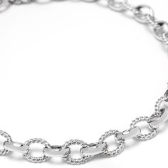 This unique cable link choker showcases an edgy, chunky style in stainless steel. Perfect as a solo statement piece or layered with multiple chunky chains for a bold, modern look. Lock and hardware in stainless steel. Preserve the elegance of your jewelry by avoiding direct contact with perfumes, body lotions, hairspray, and other chemicals. Always remove your jewelry before going to bed, bathing, showering, swimming, or engaging in physical activities like cleaning or gardening. Protect your pieces from extreme temperatures and humidity, and ensure they are not exposed to direct sunlight. After each use, clean your jewelry with a soft cloth and store it in an airtight jewelry box to maintain its luster and quality. Modern Metal Chain Necklace With Chunky Chain, Trendy Metal Chain Necklace With Solid Links, Modern Chunky Chain Stainless Steel Necklace, Modern Stainless Steel Necklace With Chunky Chain, Modern Metal Chain Necklace, Modern Stainless Steel Chunky Chain Necklace, Modern Stainless Steel Chain Choker Necklace, Modern Stainless Steel Choker Chain Necklace, Modern Stainless Steel Chain Choker