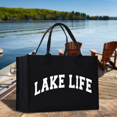 a lake life bag sitting on top of a wooden table