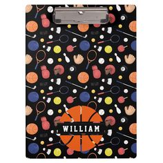 a clipboard with an orange basketball on it and lots of different sports related items