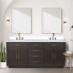 a bathroom with two sinks and mirrors on the wall