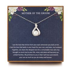 a mother's necklace with a poem on it in a wooden box that reads, mother of the groom