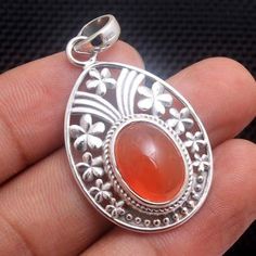 Elegant Natural Carnelian Oval Shape Gemstone Stylish Pendant - 925 Sterling Silver Handmade Designer Pendant Jewelry Length 1.7" -ap3382 ( Stamped 925)MATERIAL - 925 STERLING SILVERGEMSTONE -  CarnelianPENDANT SIZE - 1.7" SHAPE - OvalPENDANT WEIGHT - 7 GRAMSSTONE SIZE - 15 x 10 MM Silver Carnelian Oval Cabochon Jewelry, Silver Carnelian Teardrop Jewelry, Silver Teardrop Carnelian Jewelry, Pretty Earrings Dangle, Carnelian Pendant, Sterling Silver Jewelry Handmade, Oval Pendant, Agate Gemstone, 925 Sterling Silver Jewelry