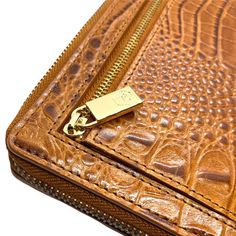 Embossed full-grain vegetable tanned premium leather RFID - protected 4.0"H x 8.0"W x 1.0"D 19 credit cards slots ID window 4 slip pockets in wallet Boarding pass compartment Bill zip compartment Back coin zip compartment Fabric lining Snap closure Gold-tone hardware Branded gift box Imported More real leather wallets >>> We also have a lot of ladies leather wallets. Luxury Rectangular Trifold Wallet For Daily Use, Luxury Business Trifold Wallet, Luxury Rectangular Trifold Wallet, Rectangular Cognac Wallet For Business, Cognac Rectangular Wallet For Business, Luxury Trifold Wallet With Leather Lining, Luxury Trifold Wallet With Rfid Blocking For Daily Use, Luxury Rectangular Trifold Wallet For Travel, Luxury Cognac Wallets With Interior Card Slots