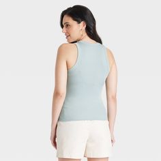 Dress up for casual outings in cool style with this Ribbed Tank Top from A New Day™. Framed by a crew neckline, the sleeveless tank top features a ribbed design and a flattering slim fit to create a sleek silhouette. Made from soft, stretchy fabric, this ribbed tank top offers comfortable all-day wear. Pair this top with jeans, shorts or trousers on warm days, or layer under jackets or cardigans for cozy styling when the weather turns cooler. A New Day™: Style that goes wherever you do. Crew Neck Tank Top For Everyday Spring Wear, Spring Crew Neck Tank Top For Everyday, Everyday Spring Crew Neck Tank Top, Casual Crew Neck Tank Top For Everyday, Everyday Casual Crew Neck Tank Top, Casual Crew Neck Tank Top, Casual Racerback Vest For Everyday, Casual Everyday Racerback Vest, Casual Camisole Tank Top