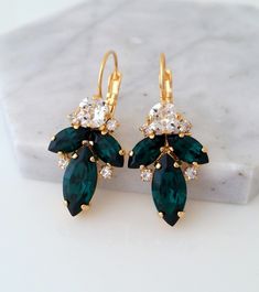 "✤ I can make these earrings with many other colors to match your wedding party scheme (or any other occasion). Please just contact me. ✤ Matching bracelets are available here: https://etsy.me/2WMaKVD ✤ Matching necklace is available here: https://etsy.me/33jYcYj ✤ Available also in silver plating, yellow gold plating. Just choose at \"Metal type\" box. ✤ Made with CRYSTALLIZED™ - Swarovski crystals. ✤ Drop/lever back Earrings. Clip-on earrings are available upon request. ✤ Size approx - 25mm x Elegant Green Bridal Earrings For Bridesmaids, Unique Wedding Earrings, Drop Gold Earrings, Emerald Drop Earrings, Bridal Drop Earrings, Blue Bridal Earrings, Bridal Earrings Studs, Emerald Earrings Drop, White Opal Earrings