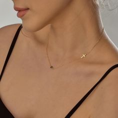 This delicate Sideways Birthstone Cross Necklace is the perfect gift for her! This Dainty Birthstone Necklace features a tiny cross charm, making it a meaningful and stylish accessory. Give this unique Gift Birthstone Necklace to any special woman in your life and watch her eyes light up with joy. This Tiny Cross Charm Gift for Women is a lovely way to show someone you care. ♡ CROSS ∙ BIRTHSTONE ∙ NECKLACE ◇  ◇ Made to Order ◇ Dimensions: Cross: 12 mm x 10 mm (0.47'' x 0.40'') ; Birthstone 3 mm (0.12'') ◇ Material Options: High Quality 925k Silver and 14k Solid Gold ◇ Birthstone Options: High-Quality Zircon stones ◇ Color Options: Yellow Gold ∙ Rose Gold ∙ White Gold ◇ All our jewelry is made with passion and care ◇ Package: Ready to Gift - Jewelry Box ♡ HOW ∙ TO ∙ ORDER → → STEP 1: Choose Dainty Cross Necklace For Gift, May Birthstone Cross Pendant Jewelry Gift, Tiny Cross, Charm Making, Her Eyes, Necklace Dainty, Cross Charms, Charm Gift, Birthstone Necklace