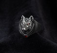 * Wolf ring , Men wolf ring , Mens wolf ring , Wolf ring men , Wolf head ring , Wolf accessories * Product Weight: Approximately 12 grams ( May differ due to sizing and handmade structure) ( 1 ounce = 28.5 grams ) * Preparation Time usually 1-3 days. All rings are designed and hand crafted by us. SIZING * All sizes are available since we hand craft each ring individually. We provide you size conversion charts for different measurement systems on the pictures. You may easily measure and determine your size OR anytime please MESSAGE to us for help about finding your size. SHIPPING * Express shipping USA, Canada and EU and UK with FEDEX , UPS, DHL and TNT. However due to increased costs of shipping in order to provide you best possible prices in the market we use economy shippings for other c Silver Ring With Wolf Design, Wolf Rings, Wolf Accessories, Wolf Bracelet, Grand Bazaar Istanbul, Wolf Ring, Animal Ring, Silver Wolf, Head Ring