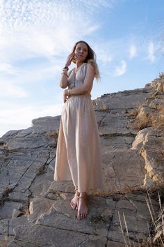 Linen/cotton dress with drawstring in beige colour. Soft and light fabric with rustic texture. Perfectly fitting sizes from S to M. Open back makes it a best dress for warm summer days and nights. It is a statement dress for a special occasion but enough comfortable for everyday use too. The dress size is adjustable by strings on the back, under the bust and on the waistline with 2 elastic bands on the sides. Will look nicely on both small and big busts. Dress has a double layer of fabric on a t Flowy Beige Linen Maxi Dress, Flowy Beige Linen Dress, Beige Flowy Linen Maxi Dress, Beige Flowy Linen Dresses, Beige Ramie Beach Dress, Bohemian Linen Maxi Dress, Bohemian Linen Dress In Natural Color, Neutral Linen Beach Dress, Bohemian Linen Dress For Vacation