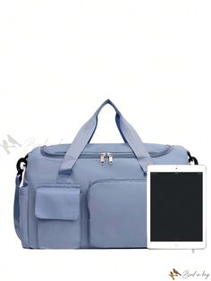 a blue duffel bag with an ipad attached to it