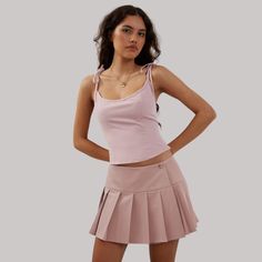 Indulge in the sophisticated style of our Preppy Hottie Pleated Skirt. Its elegant pleats and luxurious fabric create a tastefully exclusive look. Perfect for any occasion, this skirt is a must-have for any fashion lover. Elevate your wardrobe with this premium piece. Features: -85% Polyester -Low Waist -Solid Color -Pleated Design -Regular fit -Preppy style Low Waist, White Skirts, Sophisticated Style, Luxury Fabrics, Preppy Style, Fashion Lover, Pleated Skirt, Must Haves, Solid Color