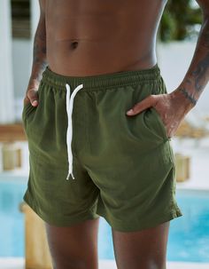 Rsq Nylon Shorts. Elastic Drawstring Waist. Welt Hand Pockets. Back Right Patch Pocket. Approximate Inseam: 6". Approximate Outseam: 17". 100% Recycled Nylon. Machine Wash. Imported. | Rsq 6" Nylon Shorts Casual Swim Trunks With Functional Drawstring, Casual Swim Trunks With Functional Drawstring For Beach Season, Relaxed Fit Nylon Swim Trunks With Drawstring, Nylon Swim Trunks With Drawstring And Relaxed Fit, Casual Athletic Shorts With Elastic Waistband For Beach Season, Casual Sports Shorts For Beach Season, Casual Solid Athletic Shorts For Beach, Casual Solid Swim Trunks For Beach Season, Casual Solid Swimwear With Drawstring