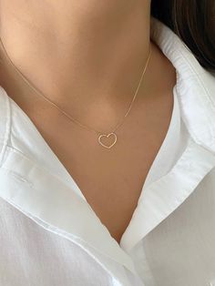 "Minimalist Dainty 14K Yellow Gold Open Heart Charm Necklace. Necklace Is Adjustable From 18\" To 16\" Inch. Perfect For Everyday Wear. Treat Yourself Or Someone Special To This Beautiful Necklace. Perfect For Layering. Chain Is A High Quality Box Chain That Feels Like Silk. Jewelry Comes In A Cute Jewelry Box Ready To Present. Model Is Wearing A 16\" Inch Chain. -All Jewelry Is New And Inspected For Quality Assurance. -jewelry Is Crafted In Genuine High Quality 14K Gold. -We Do Not Sell Gold Pl Minimalist 14k Gold Filled Necklaces With Heart Charm, Minimalist 14k Gold-filled Necklace With Heart Charm, Minimalist 14k Gold Filled Necklace With Heart Charm, Simple 14k Gold Jewelry With Heart Charm, Simple Yellow Gold Heart Pendant Jewelry, Minimalist Tarnish Resistant 14k Gold Heart Necklace, Delicate 14k Gold Heart Necklace With Adjustable Chain, Everyday 14k Gold Open Heart Charm Necklace, Minimalist Everyday Heart Necklace With Adjustable Chain