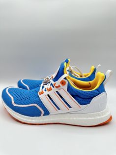 Elevate your running game with these Adidas Ultraboost 1.0 sneakers in a bright blue and cloud white colorway. These shoes feature an adjustable, low top shoe shaft style with a breathable mesh upper material and fabric insole material for ultimate comfort. The Boost technology provides exceptional cushioning and responsiveness, making them perfect for running and jogging activities. Customized and colorful, these shoes also have a solid pattern with white and blue characters, making them a styl Blue Characters, Athletic Outfit, Adidas Ultraboost, Blue Clouds, Adidas Ultra Boost, Cloud White, Ultra Boost, Athletic Outfits, Solid Pattern