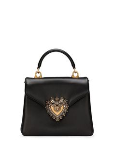 Dolce and Gabbana Devotion Tote Bag in Black Envelope flap top with magnetic closure Flat top handle Removable chain shoulder strap One interior slip pocket Signature embellished heart ornament Gold hardware Leather outer Fabric lining 5”W x 5.1”H x 1.8”D Made in Italy Dolce And Gabbana Bag, Black Envelopes, Black Shoulder Bag, Dolce & Gabbana, Handle Bag, Leather Tote Bag, Leather Top, Small Bags, Handbag Accessories