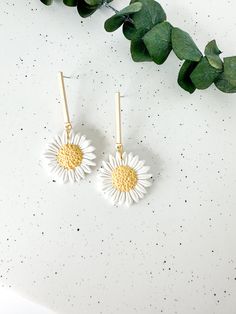 These white daisy earrings add the perfect floral statement to your spring outfits! Floral details are sculpted individually by hand in small batches. Shop the rest of the floral collection here: https://www.etsy.com/shop/PaintedLeafStudioCo?section_id=47823729 Earrings measure approximately 2 inches in length and 1 inch in width and are lightweight. Hand sculpted polymer clay earrings, crafted delicately and finished with attention to detail. Hypoallergenic nickel-free posts, hoops, hooks, and Spring 3d Flowers Dangle Earrings, Spring Handmade Flower Dangle Earrings, Handmade Flower Drop Earrings For Spring, Handmade Flower Dangle Earrings For Spring, White Daisy-shaped Jewelry For Spring, White Daisy-shaped Spring Jewelry, Daisy-shaped Earrings For Summer, Daisy Flower Earrings For Spring, White Dangle Flower Earrings For Spring